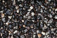 Dark basalt surface — photo by Jonathan Borba on Pexels