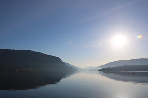 Free stock photo of lake, morning sun, mountains