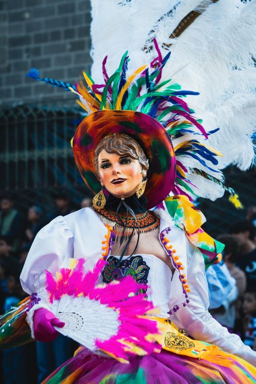 Free Colorful Mexican festival attire with feathers and makeup in Puebla. Stock Photo