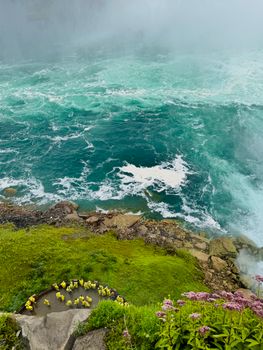 A breathtaking view of the turbulent waters below Niagara Falls from above.