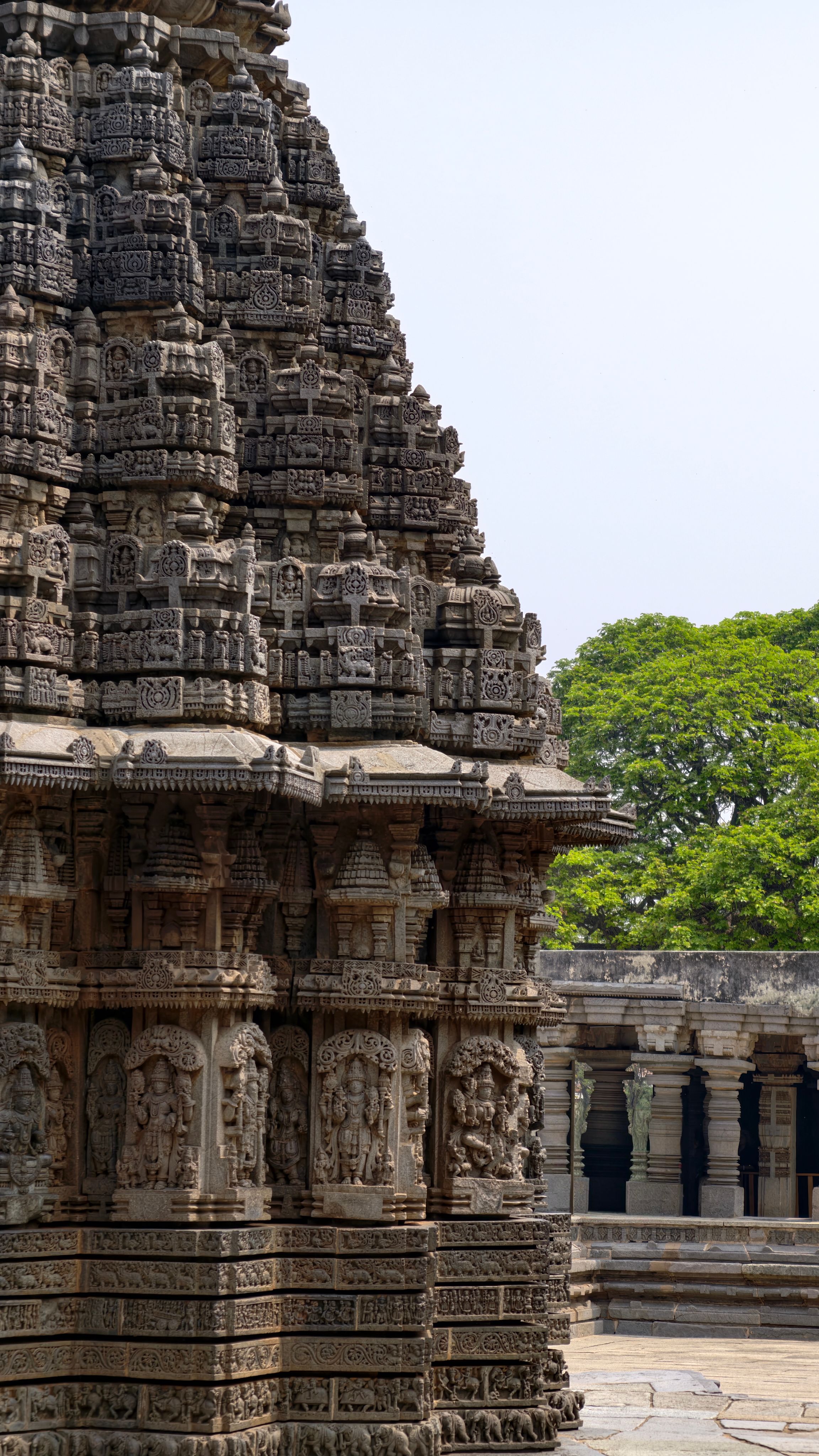Detailed view of an ancient stone temple with intricate carvings and architectural artistry.