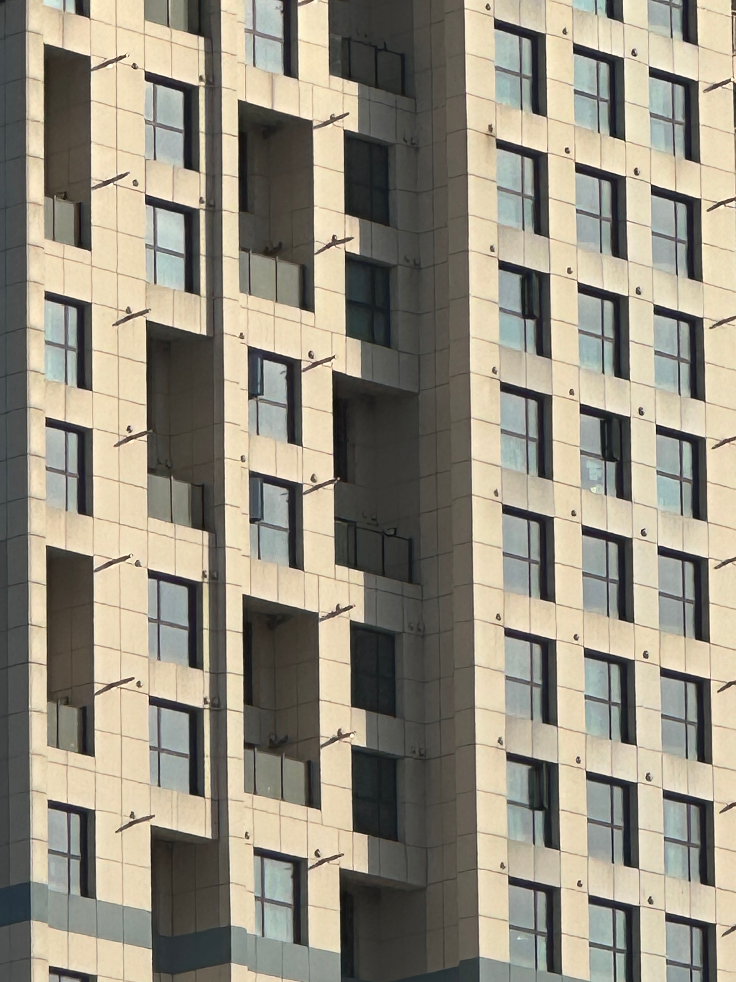 Modern High-rise Building Facade Close-up · Free Stock Photo