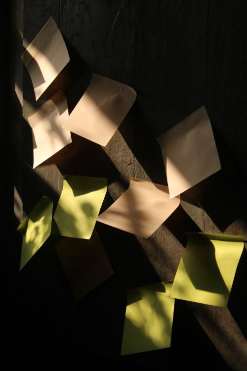 Sticky Note Light Sticky Notes on Wall with Natural Light and Shadows · Free Stock Photo