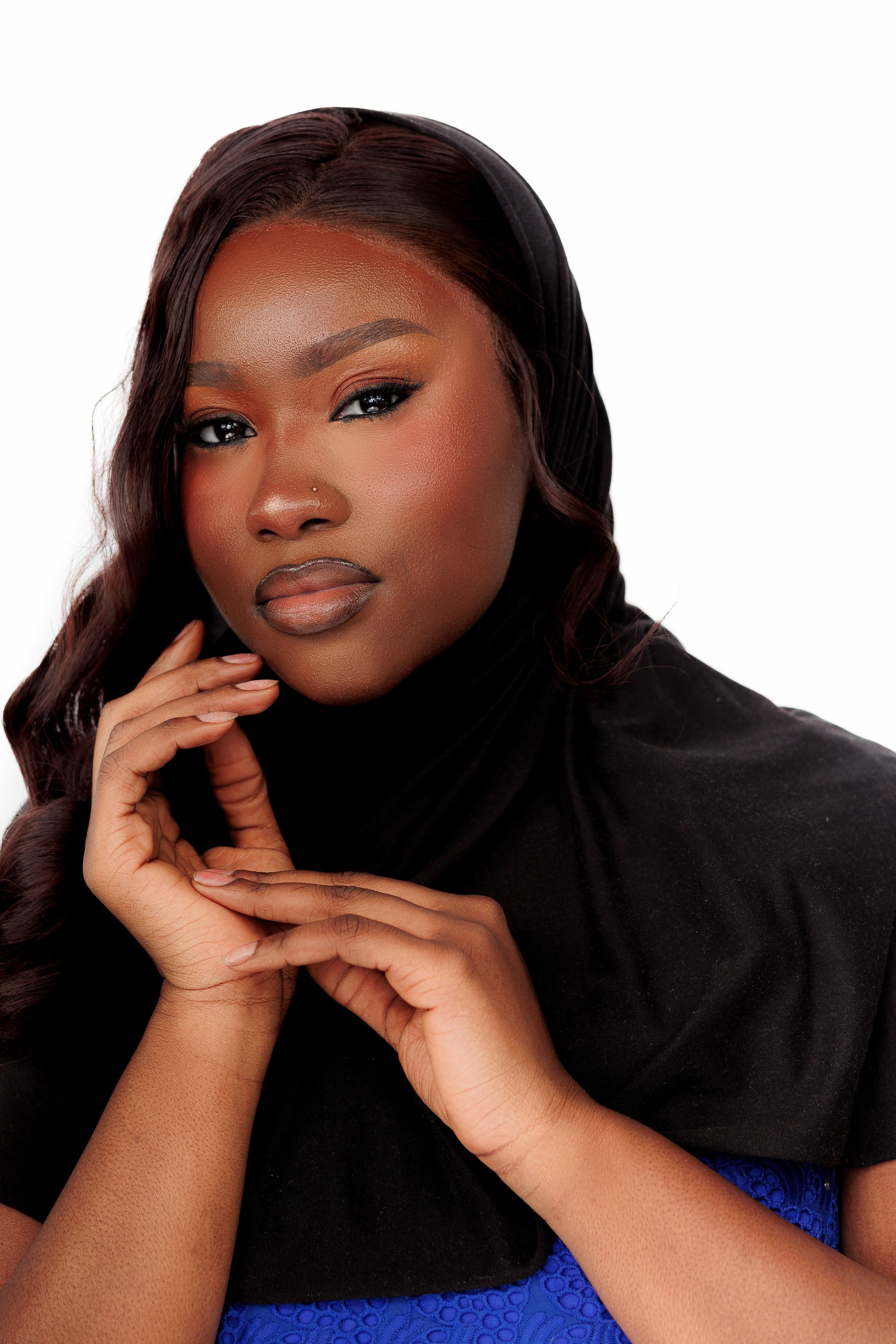 Elegant Portrait of a Woman in Black Hijab · Free Stock Photo