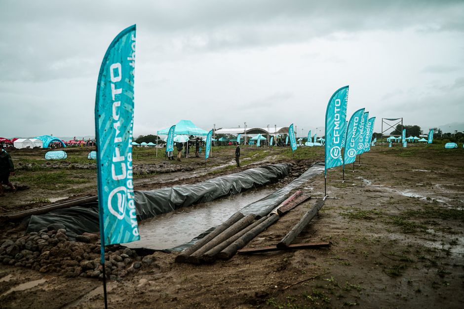 Rainy day outdoor event with CFMOTO branding in Bulakan, Central Luzon.
