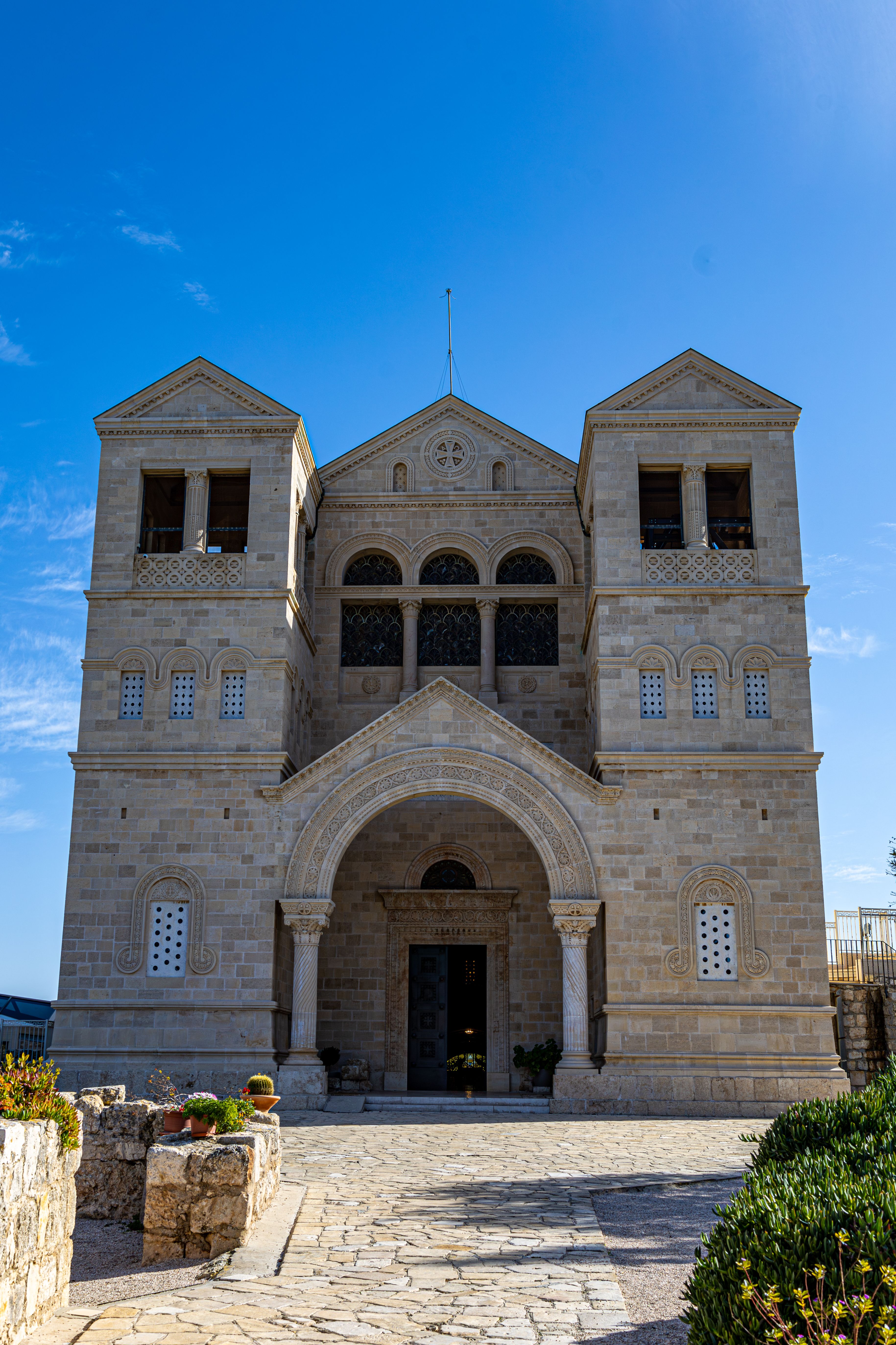 Historic Church Facade Against Blue Sky · Free Stock Photo
