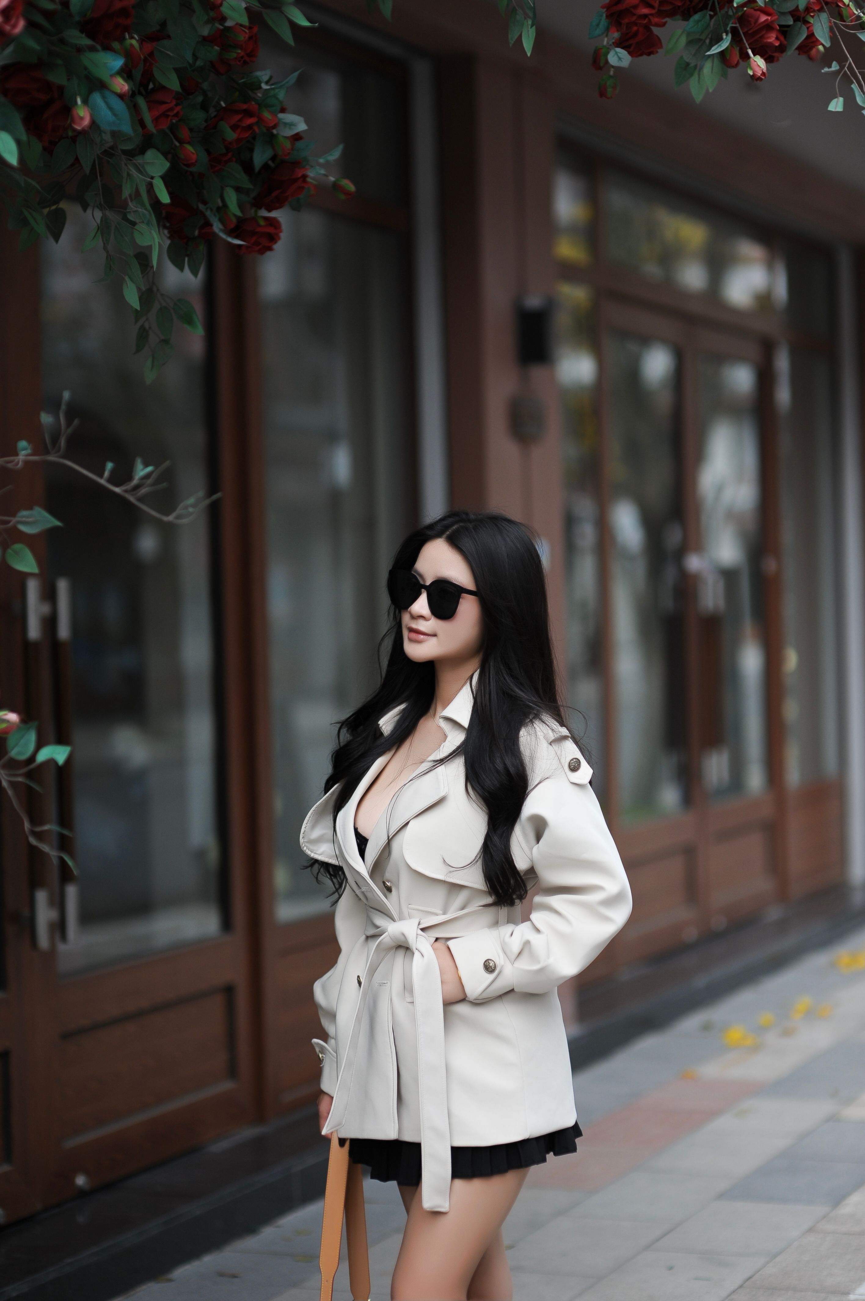 Stylish Woman Strolling in Urban Setting · Free Stock Photo