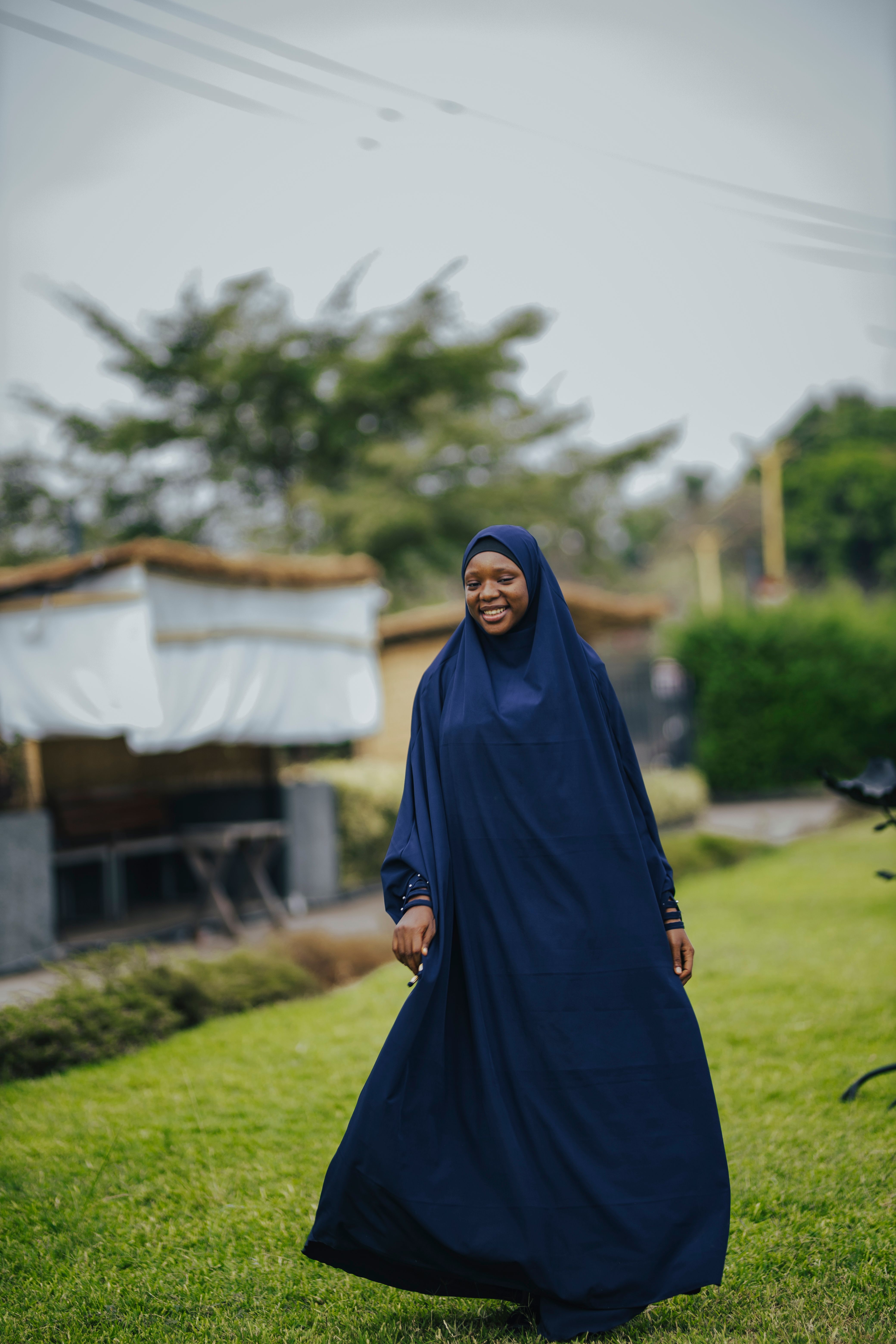 Young Woman in Hijab Walking Outdoors · Free Stock Photo
