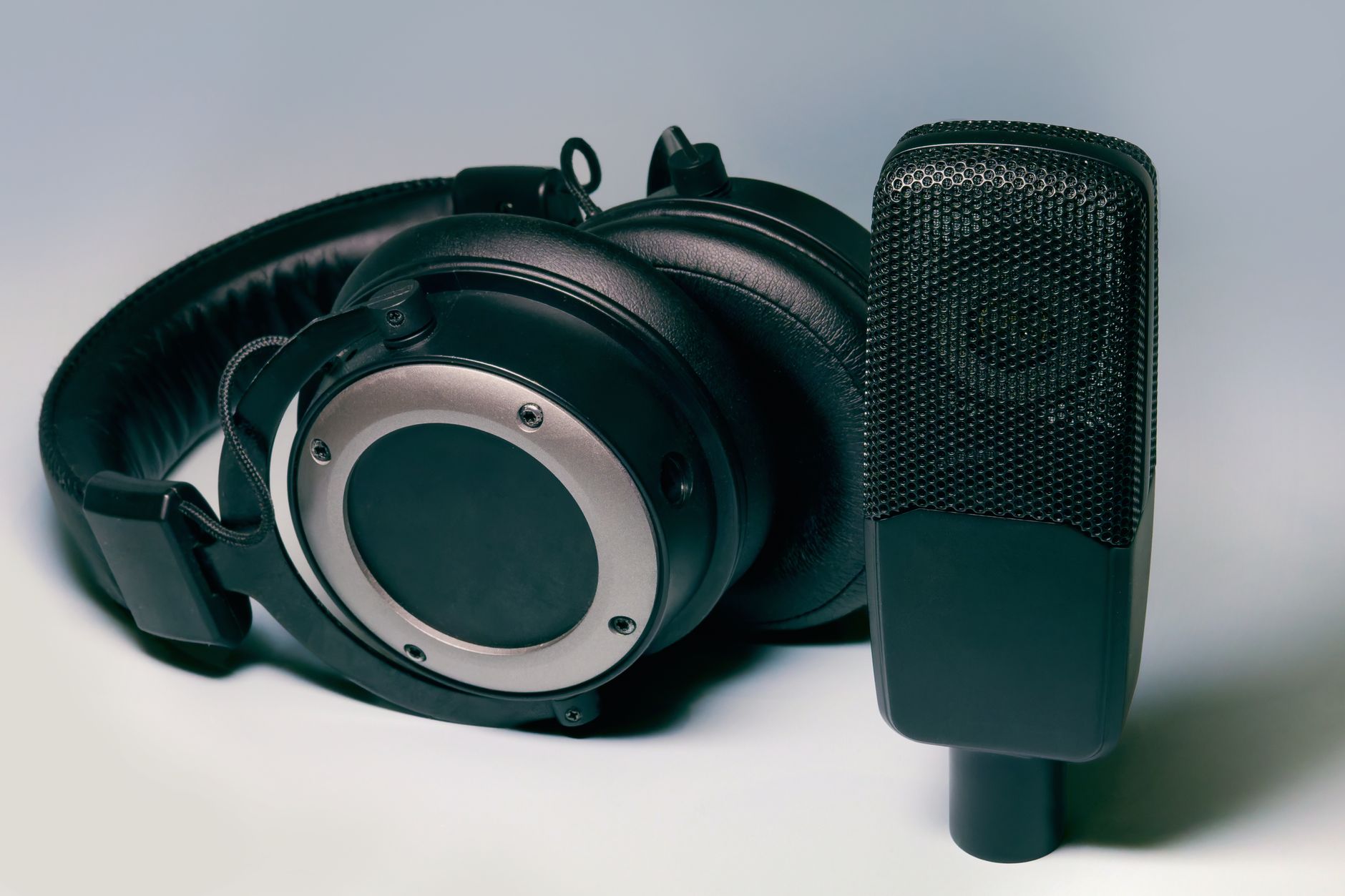 High-quality studio headphones and microphone for professional audio setups.