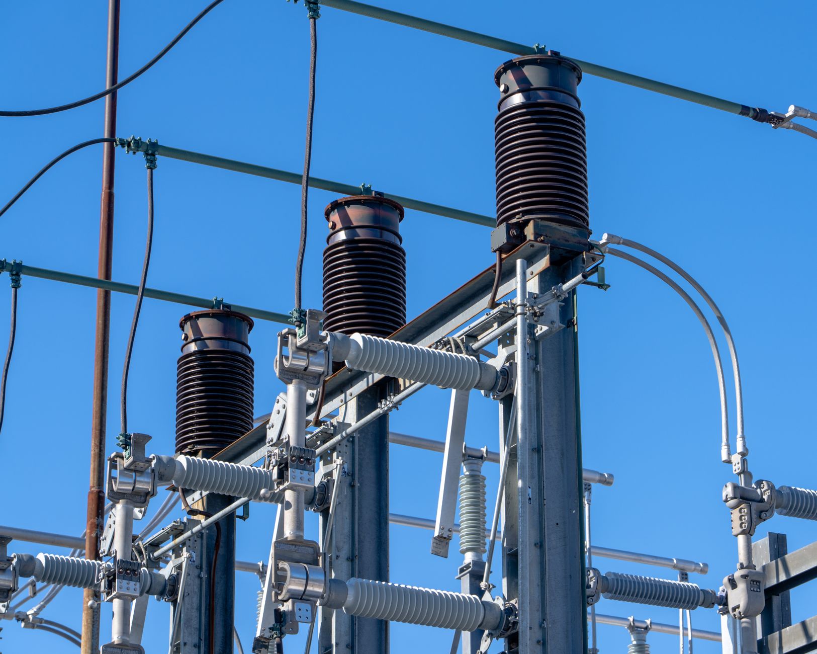 CT clamp current transformer installed on electrical panel circuit breaker wire