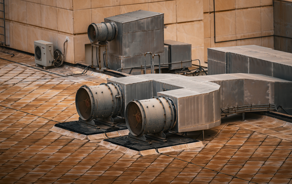Close-up of corroded condenser fins showing the impact of salt air on a coastal heat pump unit - heat pump tune up guide for Close-up of corroded condenser fins showing the impact of salt air on a coastal heat pump unit - heat pump tune up guide for