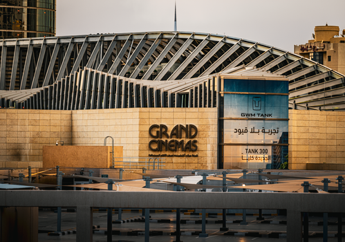 Stylish view of modern architecture in Kuwait City, featuring unique structures and vibrant city life.