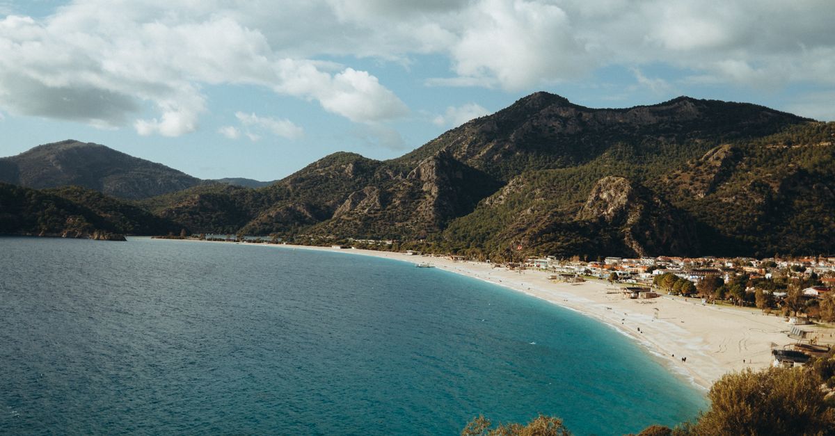 Pine-clad cliffs and turquoise bay on the Turkish Lycian coast