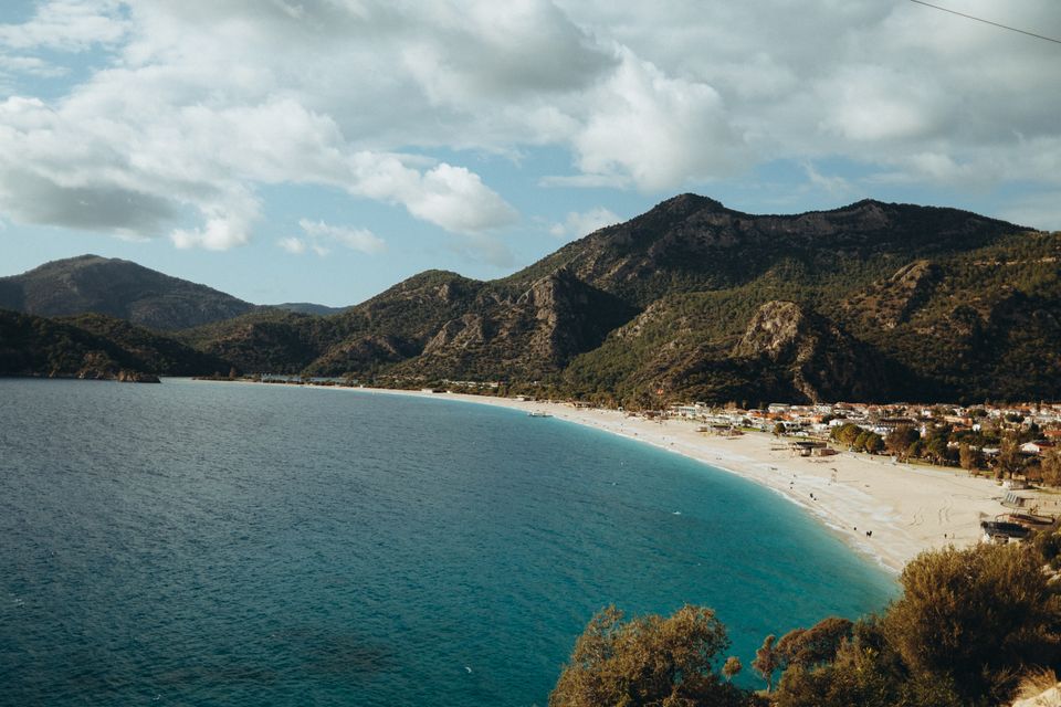 Pine-clad cliffs and turquoise bay on the Turkish Lycian coast