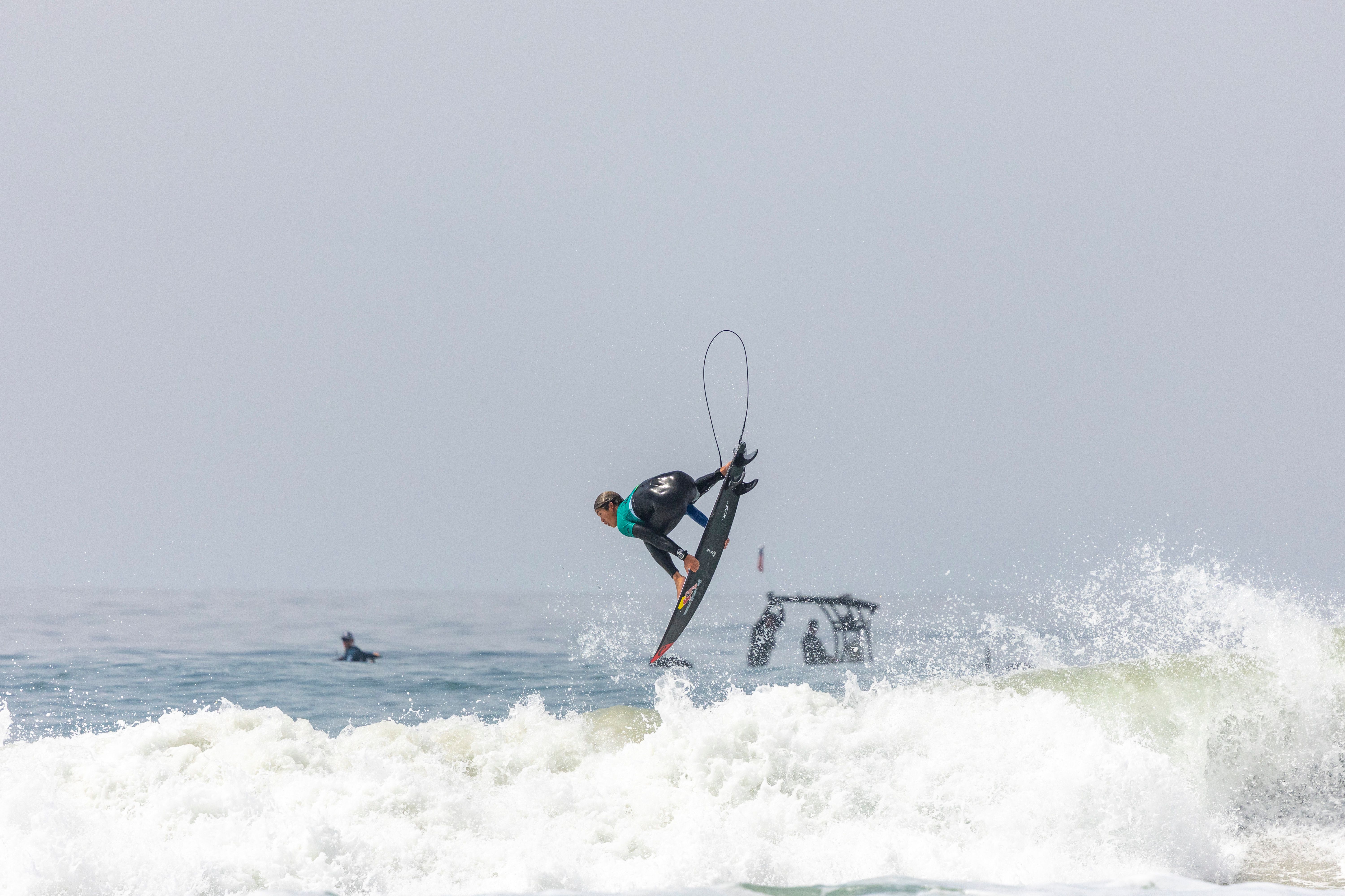 Dynamic Surfing Stunt Captured Mid-Air · Free Stock Photo