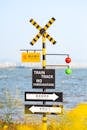 Colorful Train Track Sign by Waterfront