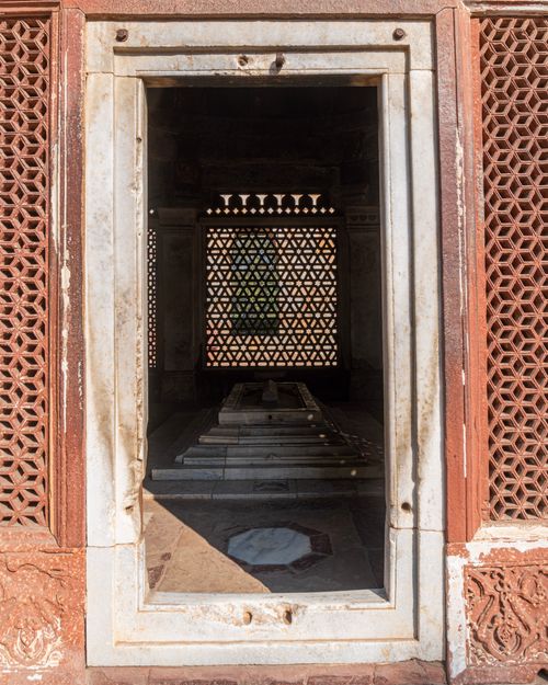 Free Explore the exquisite latticework and tomb interior of historical architecture in Delhi. Stock Photo