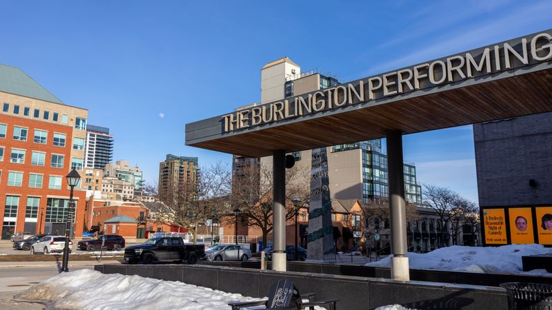 Winter view of the Burlington Performing Arts Center with urban skyline.