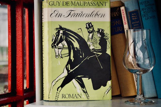 An elegant display of vintage books beside a half-full wine glass.