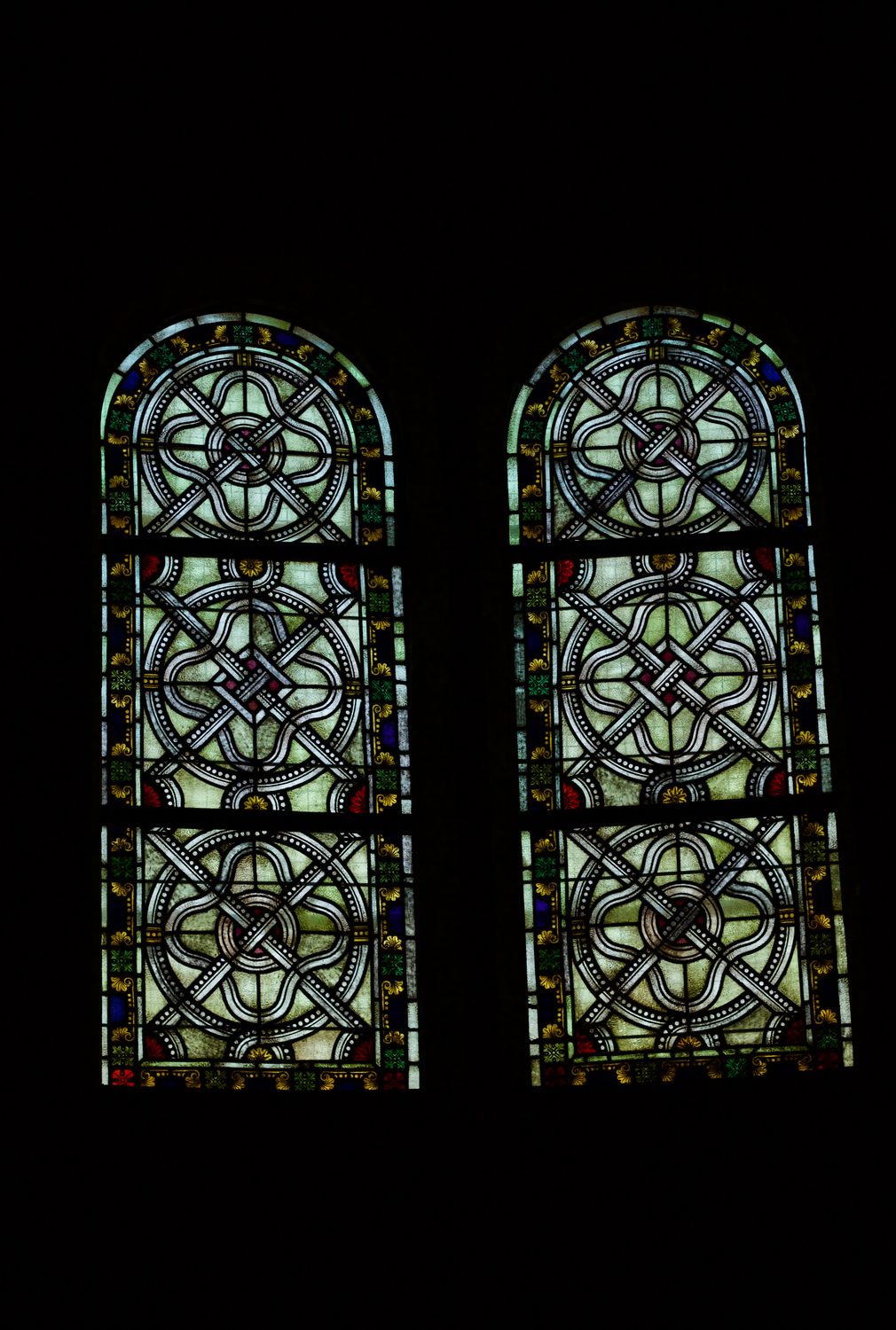 Intricate Stained Glass Windows in Classic Design · Free Stock Photo