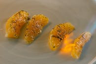 Close-Up of Torch-Flamed Orange Slices