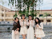 Group of Young Women Posing Outdoors