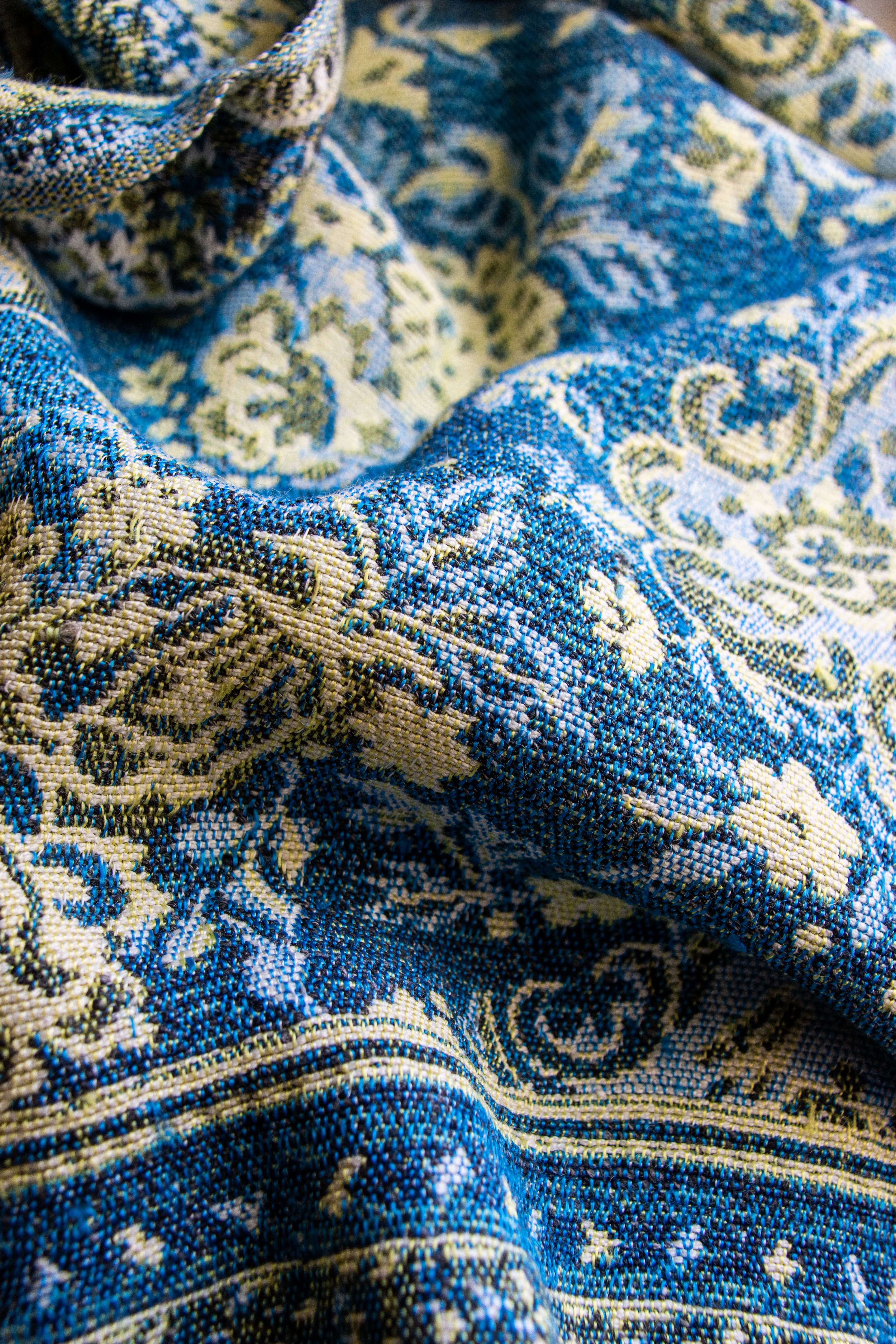 Detailed Close-up of Ornate Blue Fabric Texture · Free Stock Photo