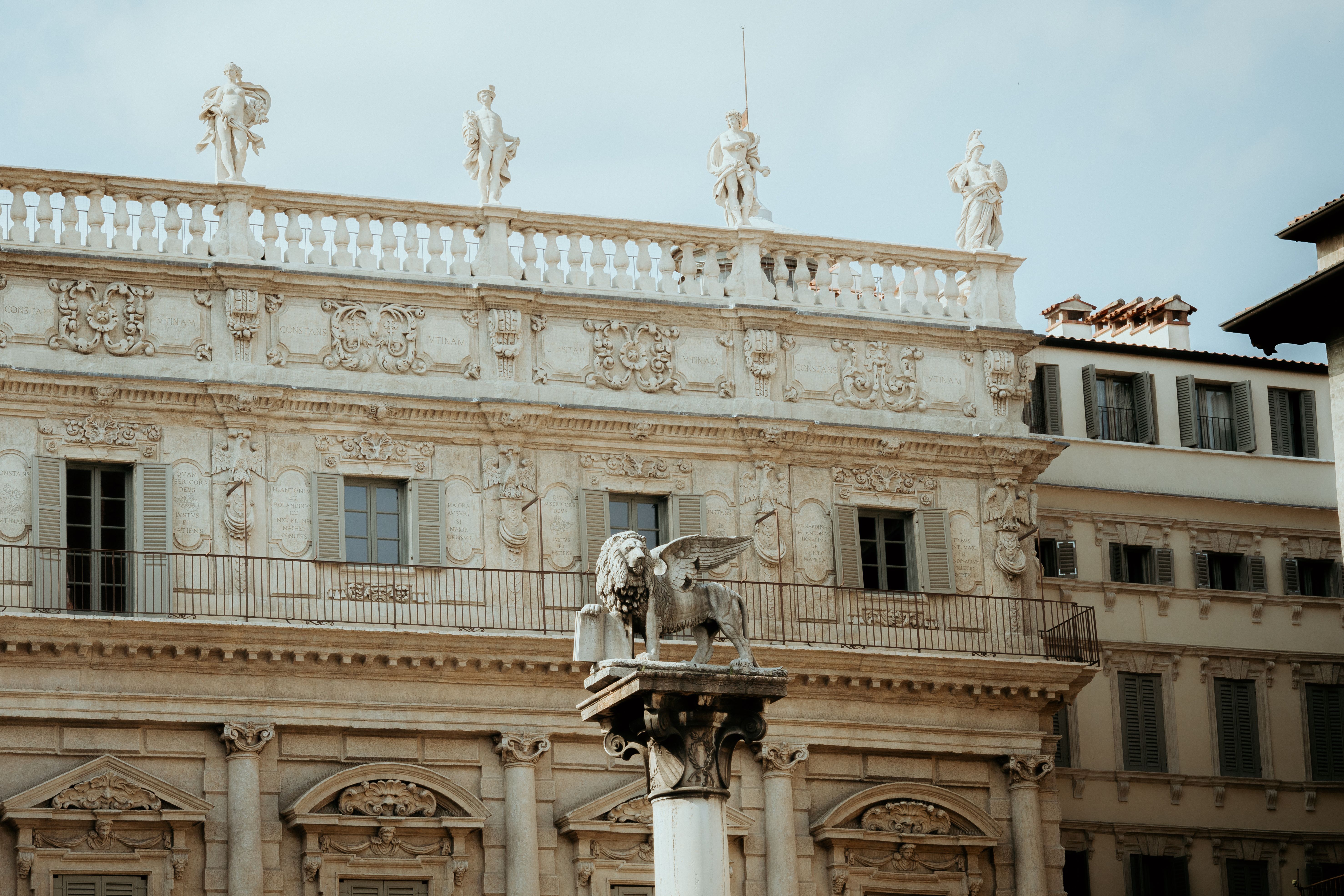 Stunning view of Italian architecture with a prominent winged lion statue in Italy.