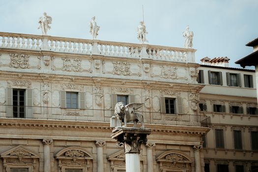 Stunning view of Italian architecture with a prominent winged lion statue in Italy.