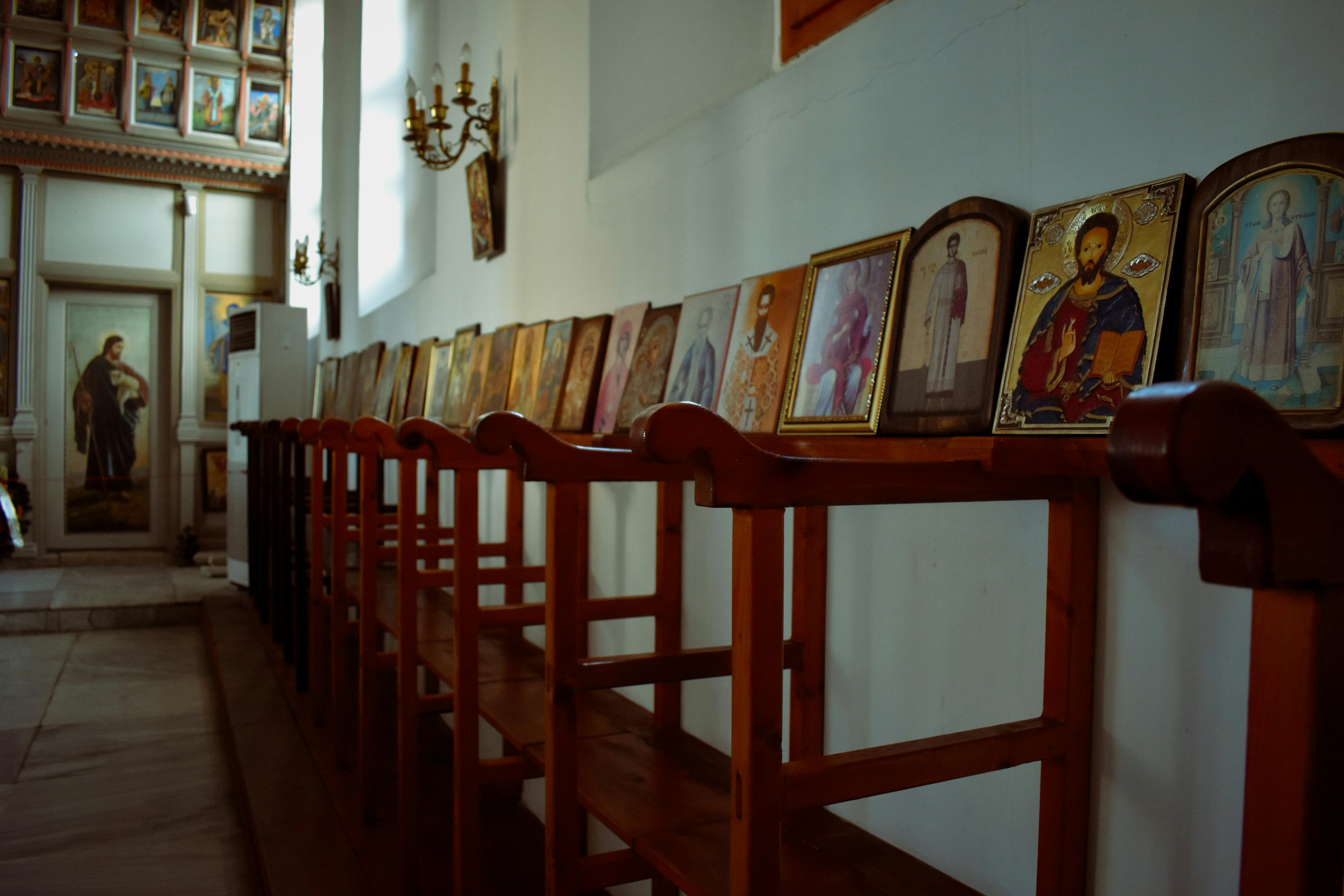 A beautifully arranged collection of religious icons inside a historic Edirne church.