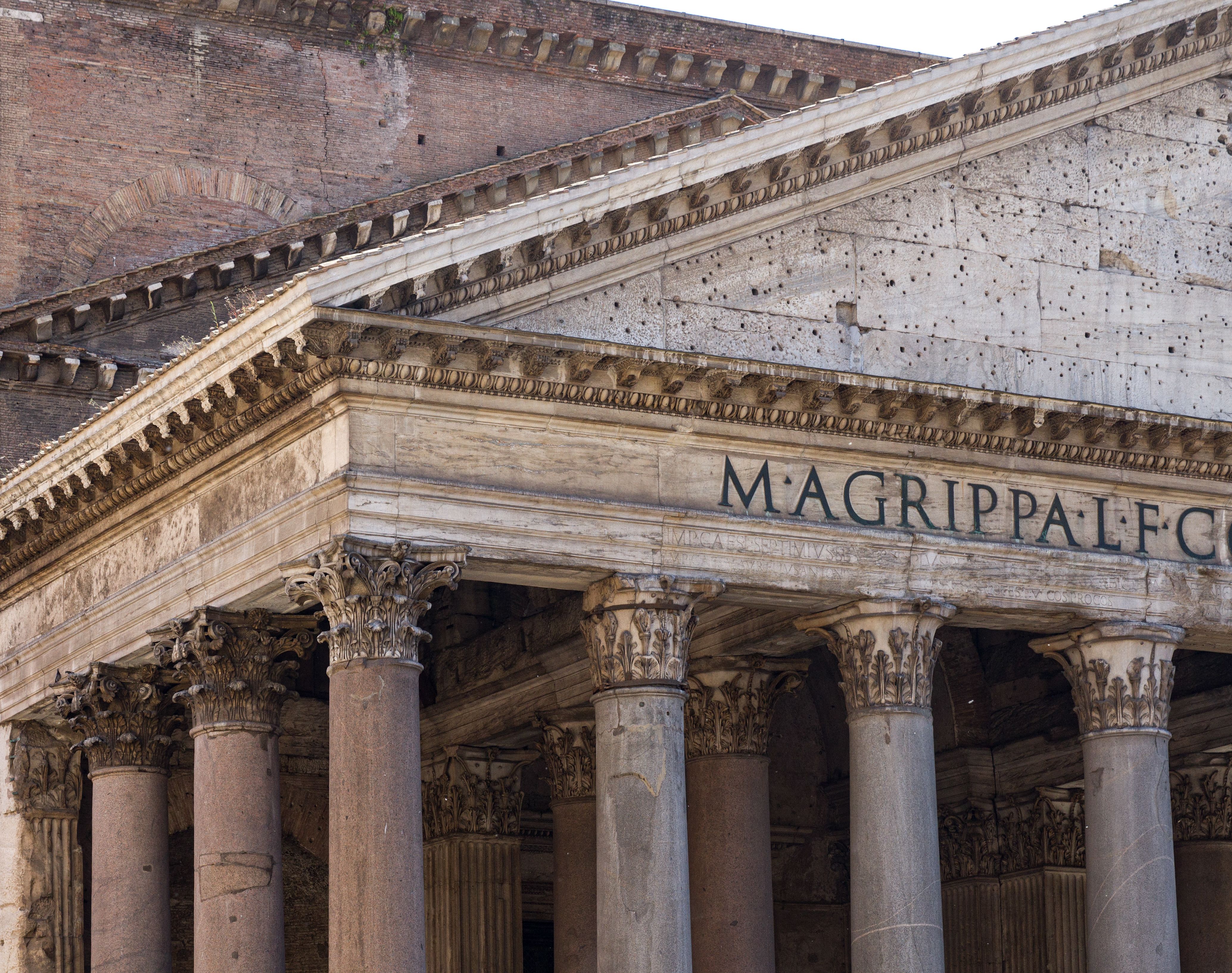 Free Detailed view of the Pantheon in Rome, showcasing its stunning ancient Roman architecture and Corinthian columns. Stock Photo