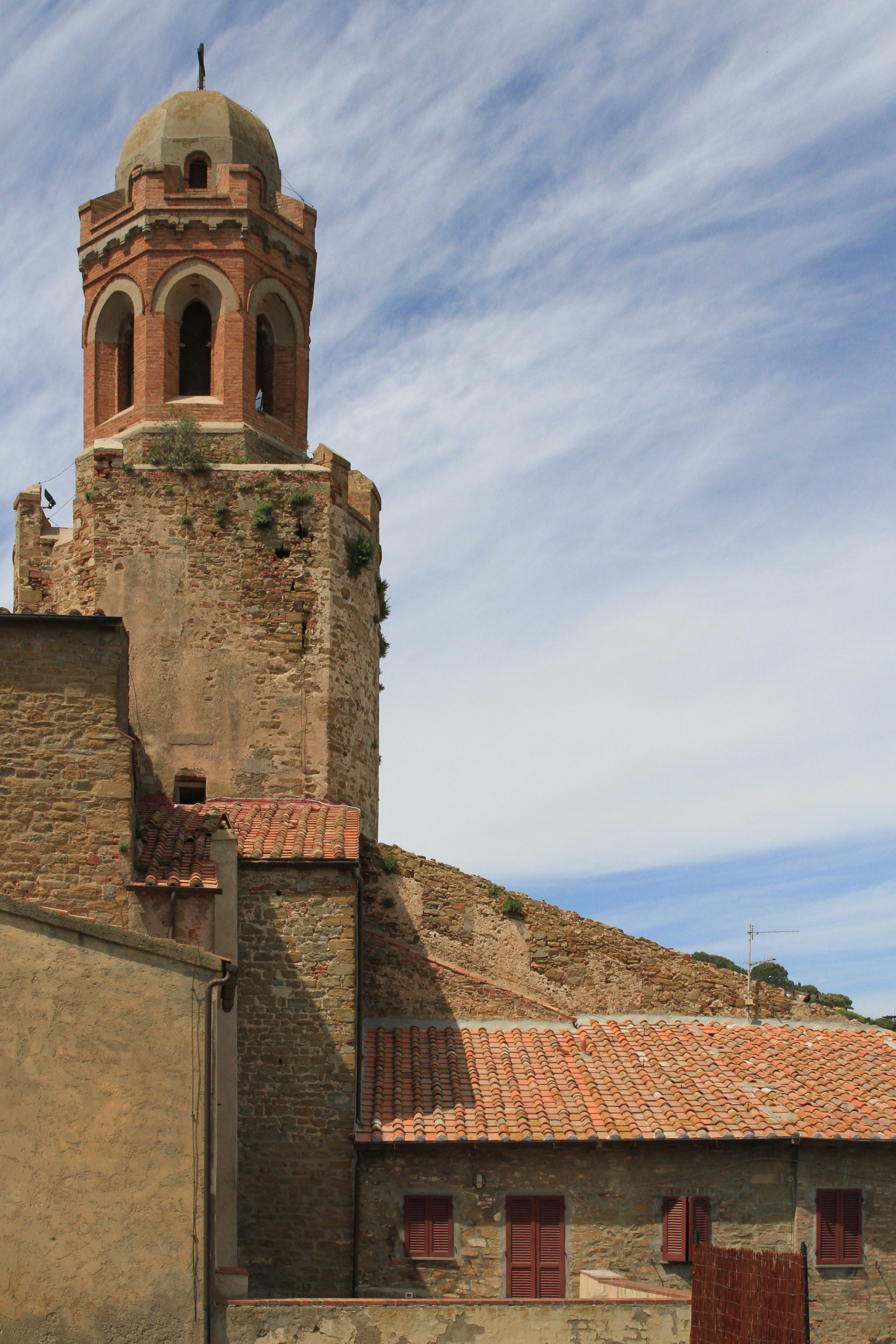Free Ancient bell tower against a vibrant blue sky in Collioure, France. Stock Photo