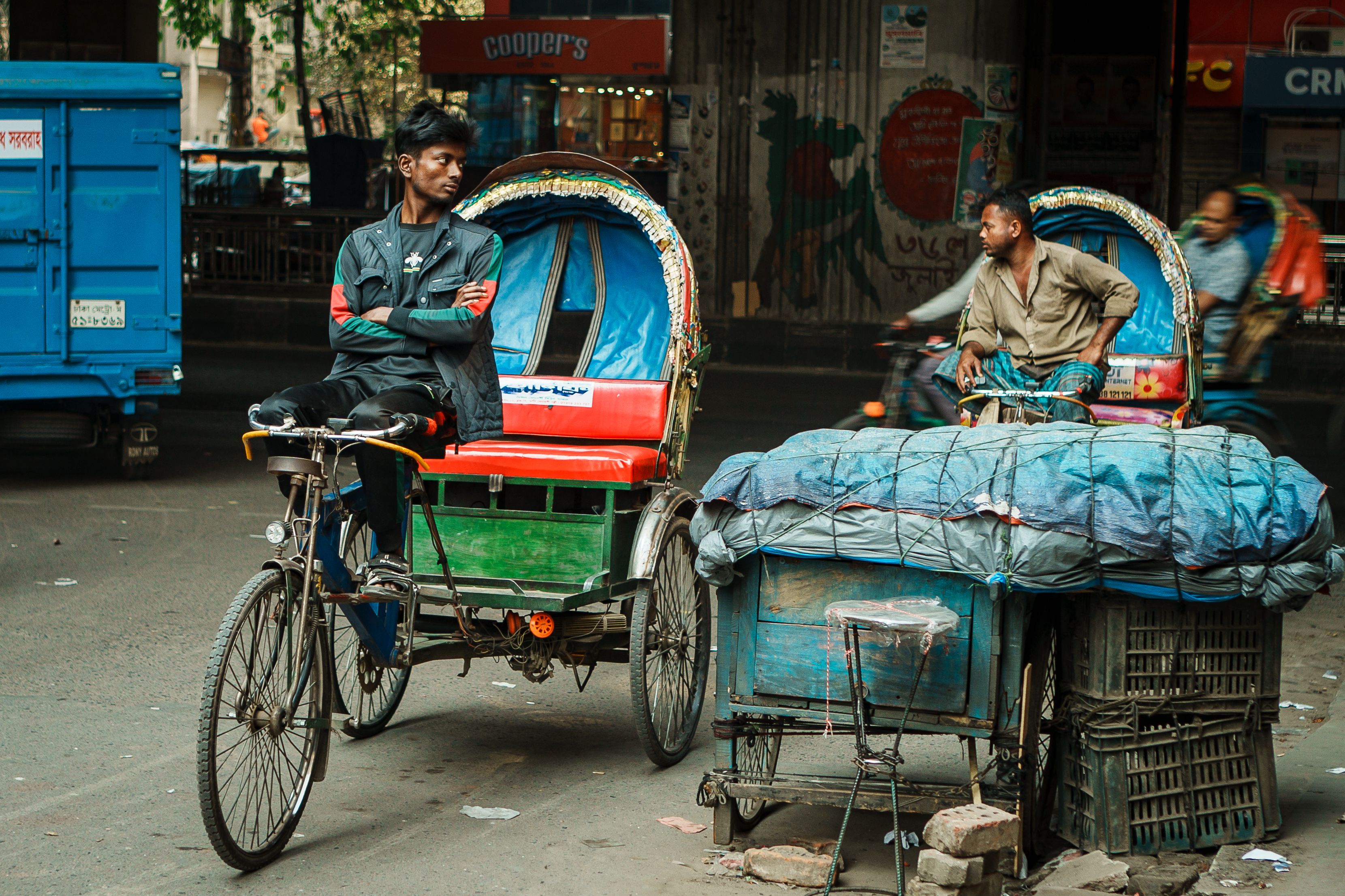 Street scene with traditional cycle rickshaws · Free Stock Photo