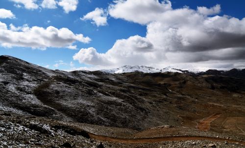 Free A dramatic winter mountain landscape under a vibrant blue sky in Elmalı, Türkiye. Stock Photo