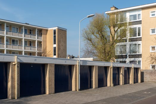 View of residential garages and apartments in Voorburg, Zuid-Holland, highlighting urban architecture.