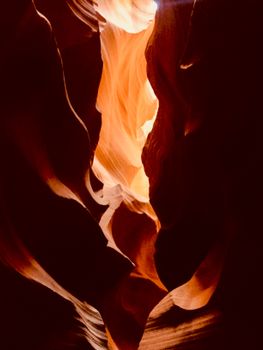A stunning view of sunlight streaming through the crevice of Antelope Canyon.