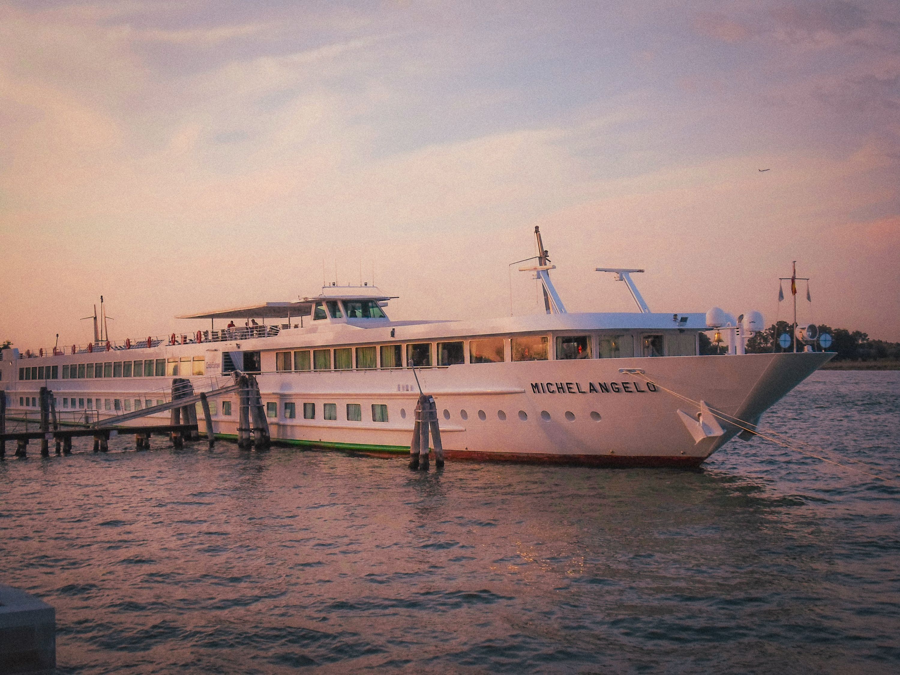 Luxury Cruise Ship Docked in Venice at Sunset