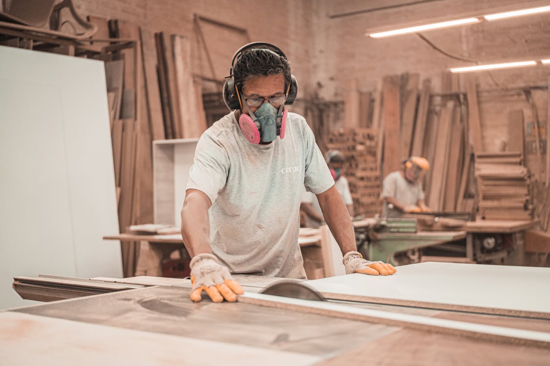 Men Working on Wood Materials