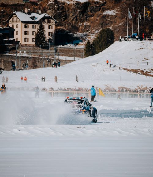Snow Racing Car Winter Racing Car in Snowy Mountain Landscape · Free Stock Photo