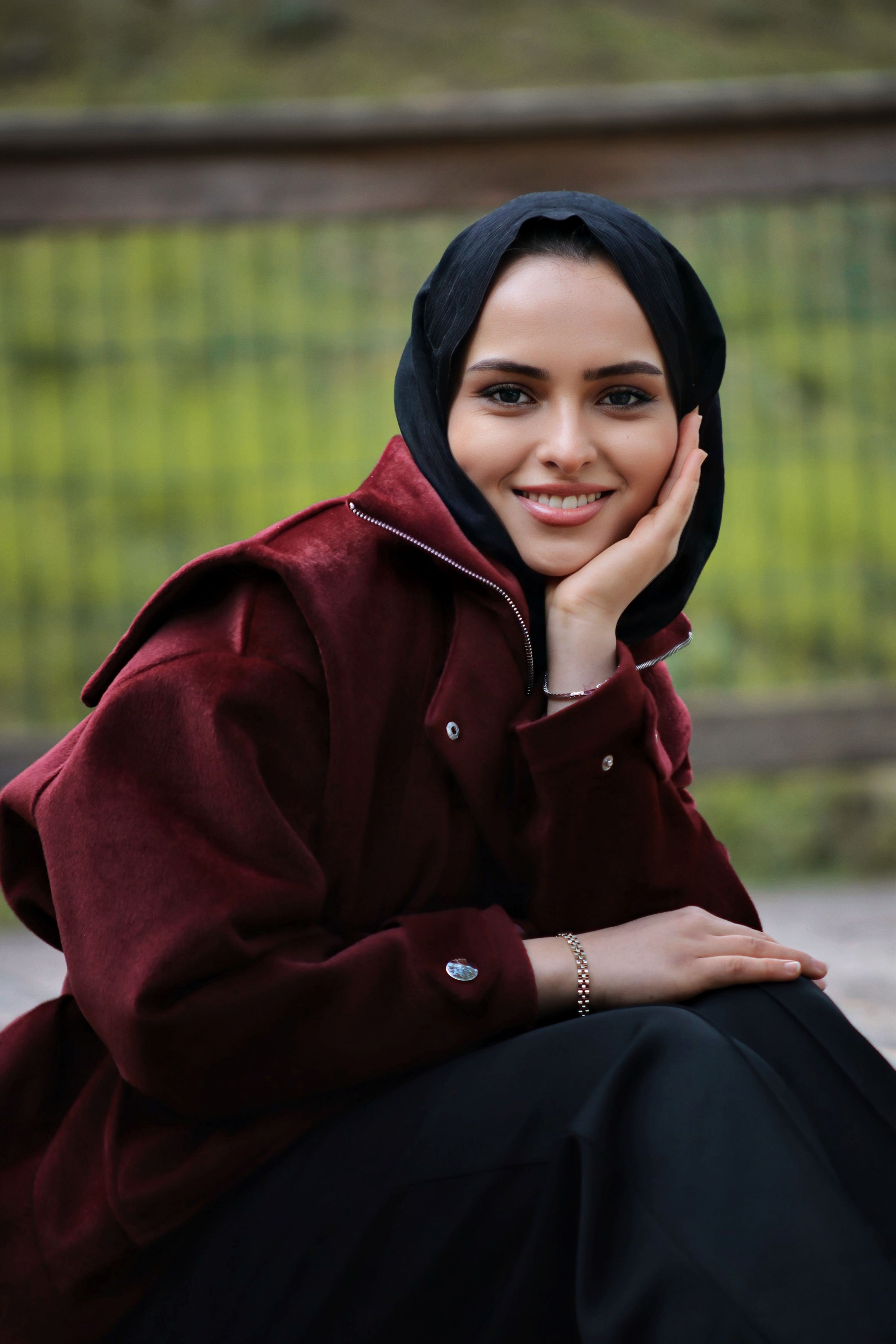 Portrait of a Smiling Woman Outdoors in Hijab · Free Stock Photo