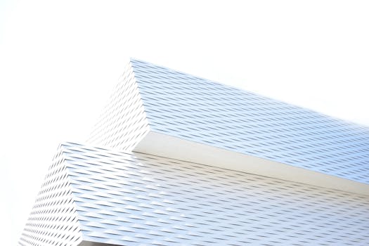 Sleek modern building facade with minimalist geometric design in Basel, Switzerland.