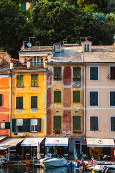 A vibrant view of Portofino's iconic colorful buildings by the harbor in Liguria, Italy.