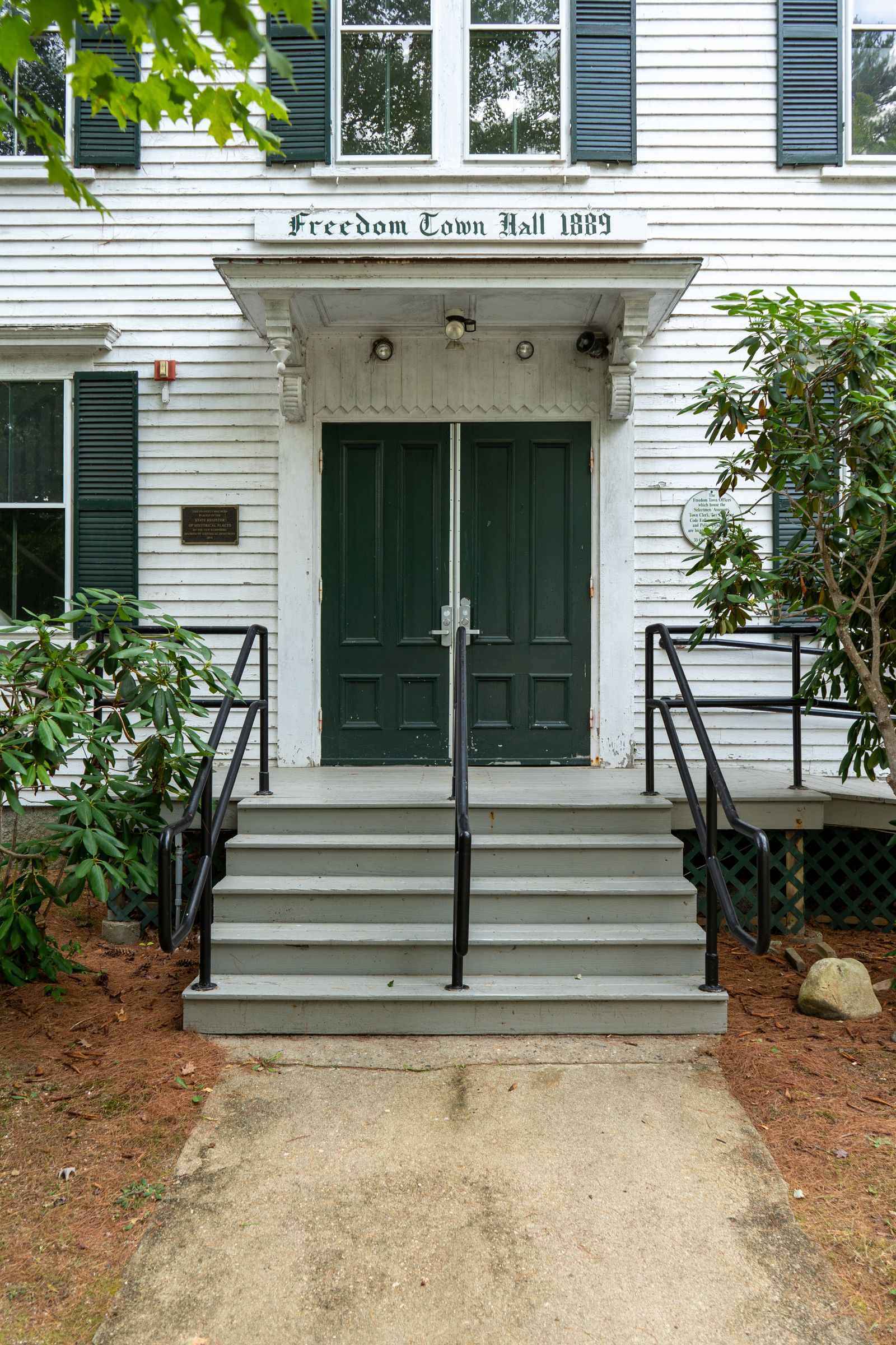 Front view of historic NH town hall with classical architecture — Milford NH historic mill town
