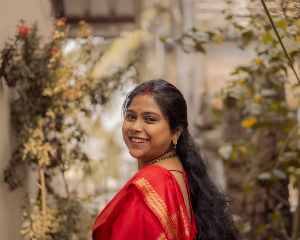 Elegant Woman in Traditional Indian Saree Outdoors · Free Stock Photo