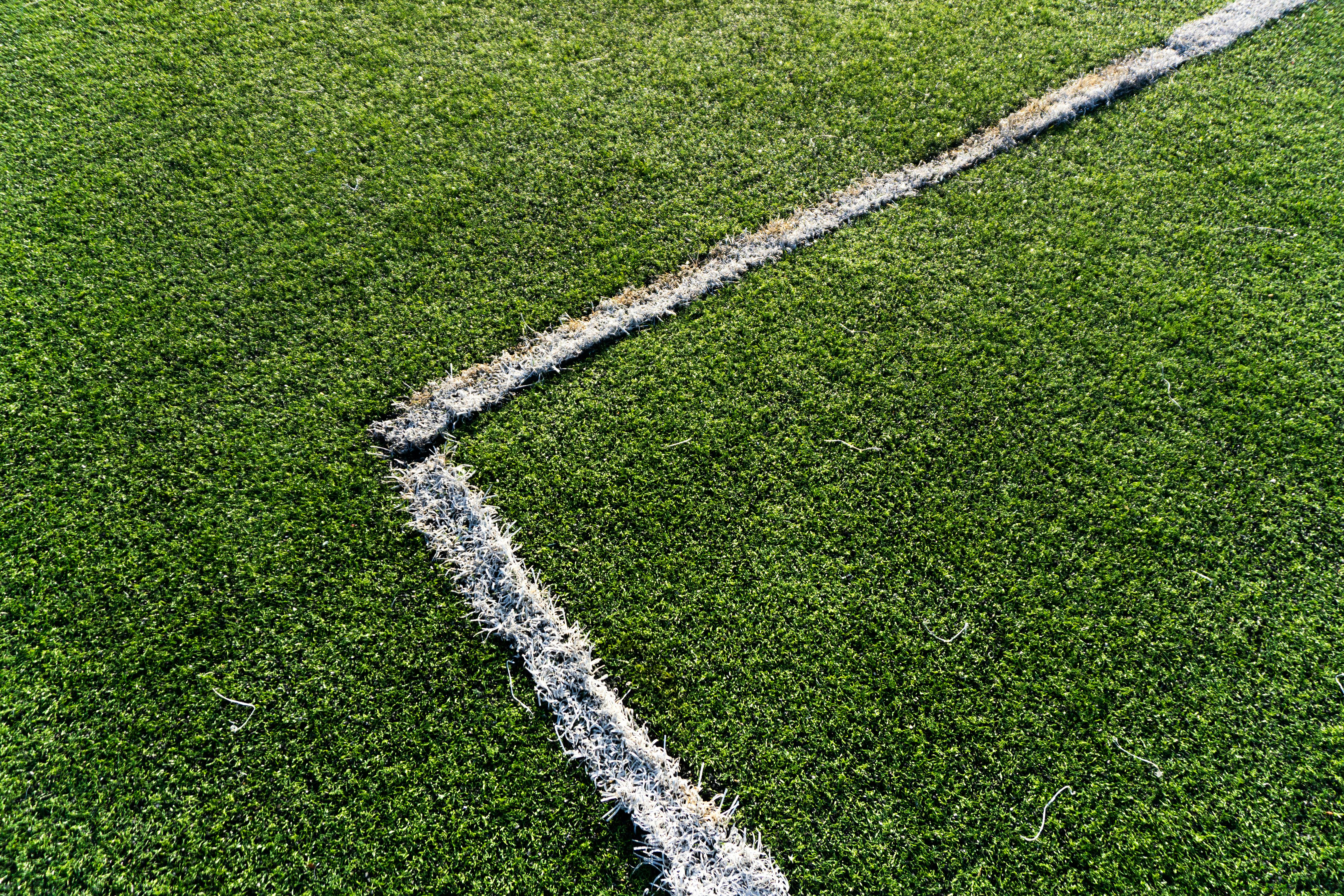 Free Detailed view of white lines on green soccer field turf, Istanbul, Turkey. Stock Photo