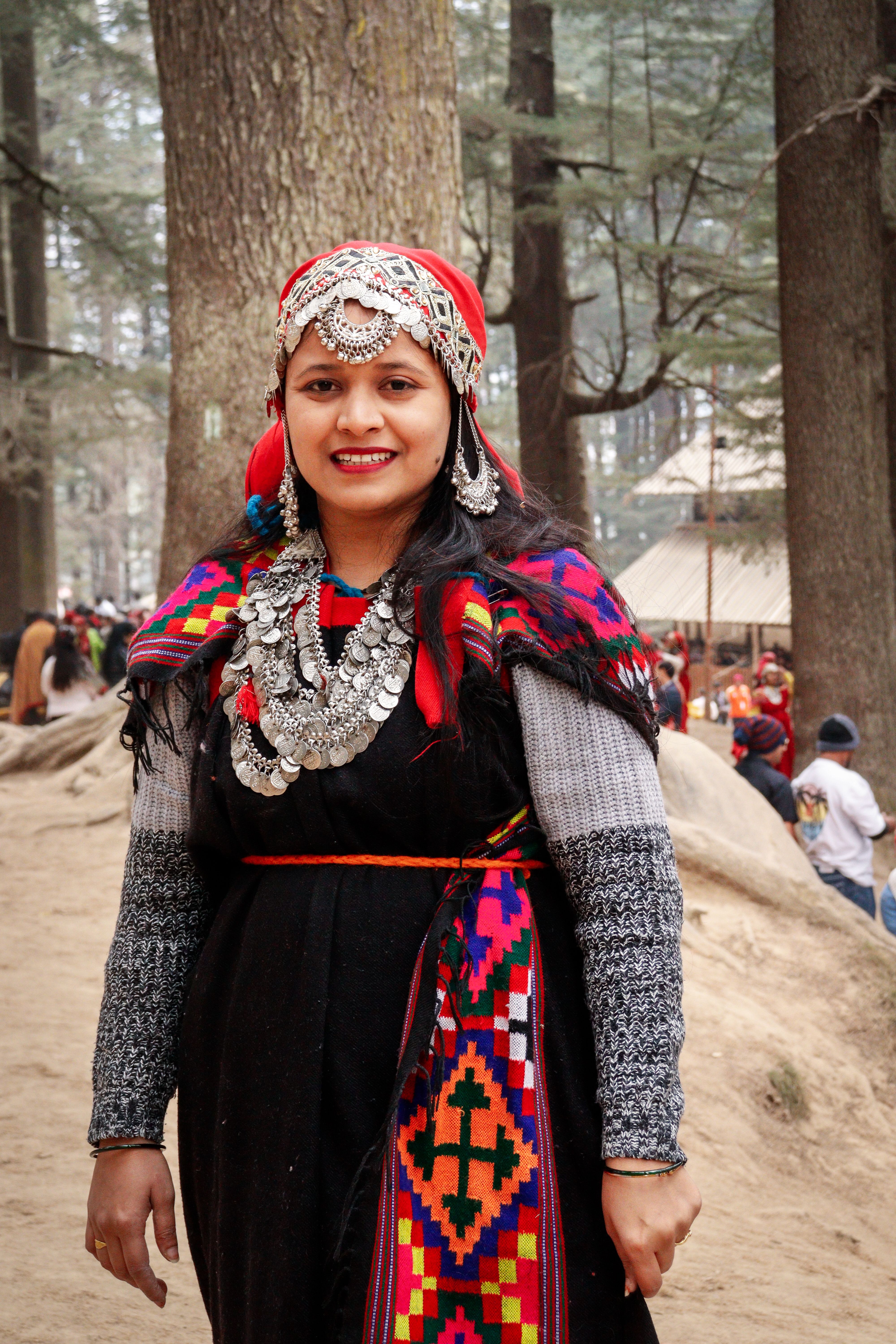 Traditional Himachali Attire in Forest Setting · Free Stock Photo