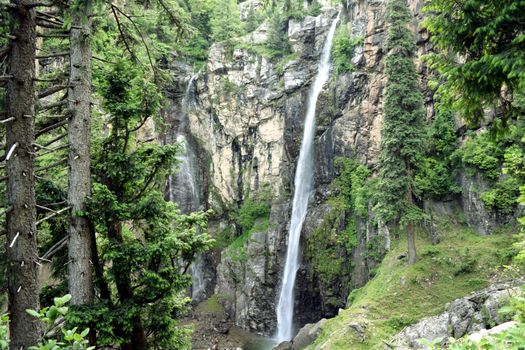 Stunning view of Jarogo Waterfall surrounded by lush greenery in Swat Valley, Pakistan.