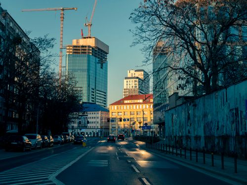 Free City street with skyscrapers and traffic in Wrocław, Poland, under a clear sky. Stock Photo