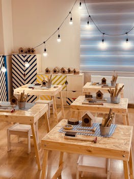 Warm and inviting woodworking classroom with tools and birdhouses ready for crafting fun.