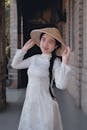 Woman in Traditional Ao Dai Dress Outdoors